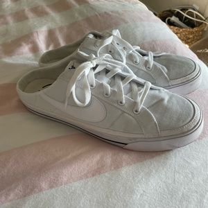 Nike slip ons- canvas white. Worn one time